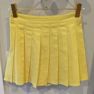Dollskill wildcat pleated pastel yellow mini skirt size M